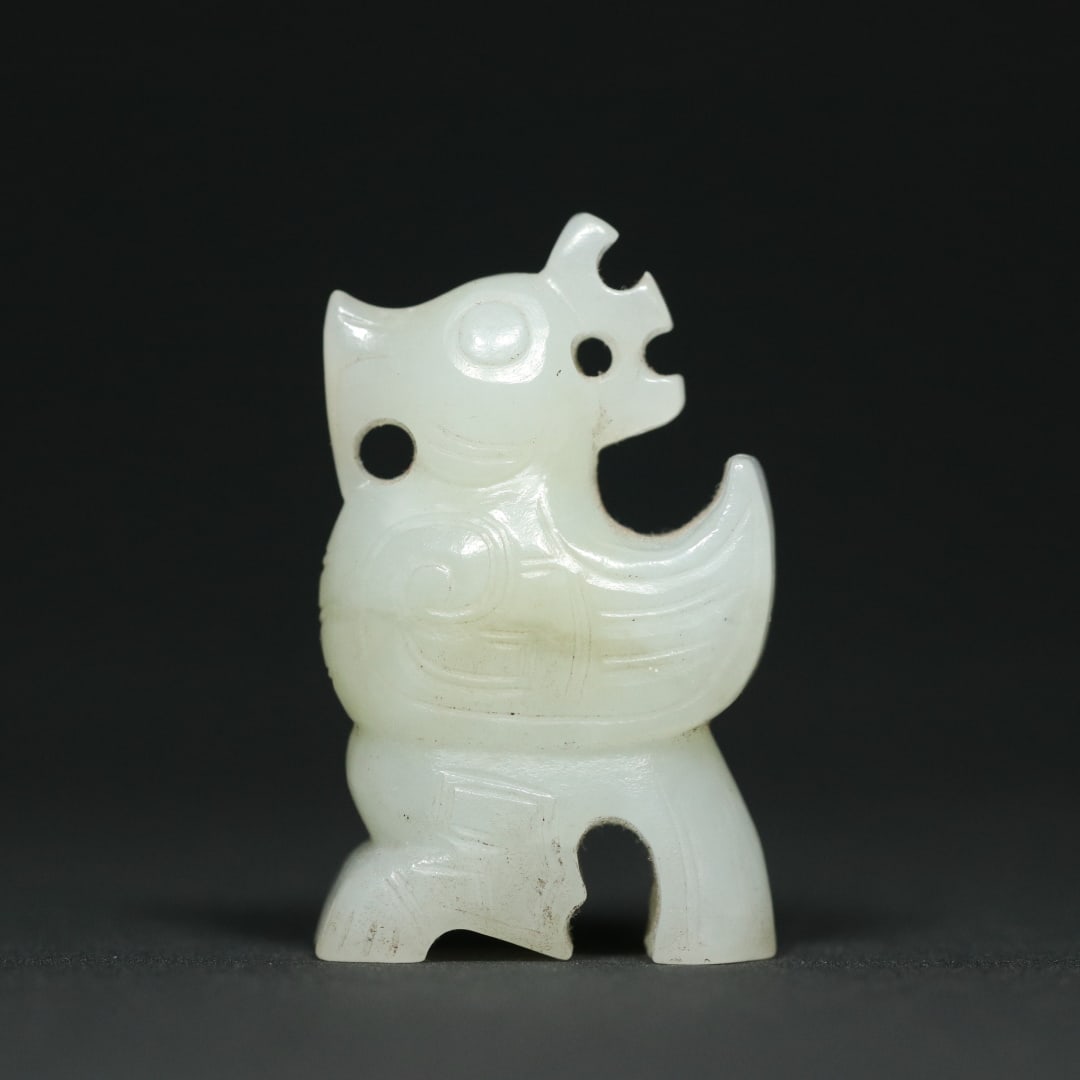 An Exquisite White Jade Bird Pendant