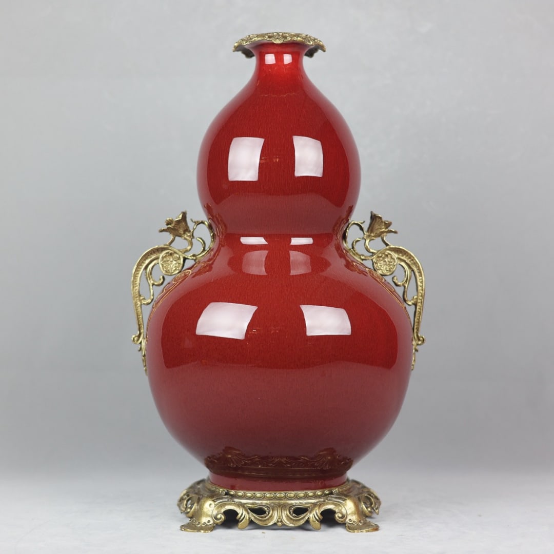 An Exquisite Lang yao Red Glazed Inlaid Bronze Gourd-Shaped Double-Ears Vase: An Exquisite Lang yao Red Glazed Inlaid Bronze Gourd-Shaped Double-Ears Vase Qing Dynasty, China Qianlong Six-character Mark Size:48cmx27cm (The Dimensions Of All Batches Are Manually Measured.If
