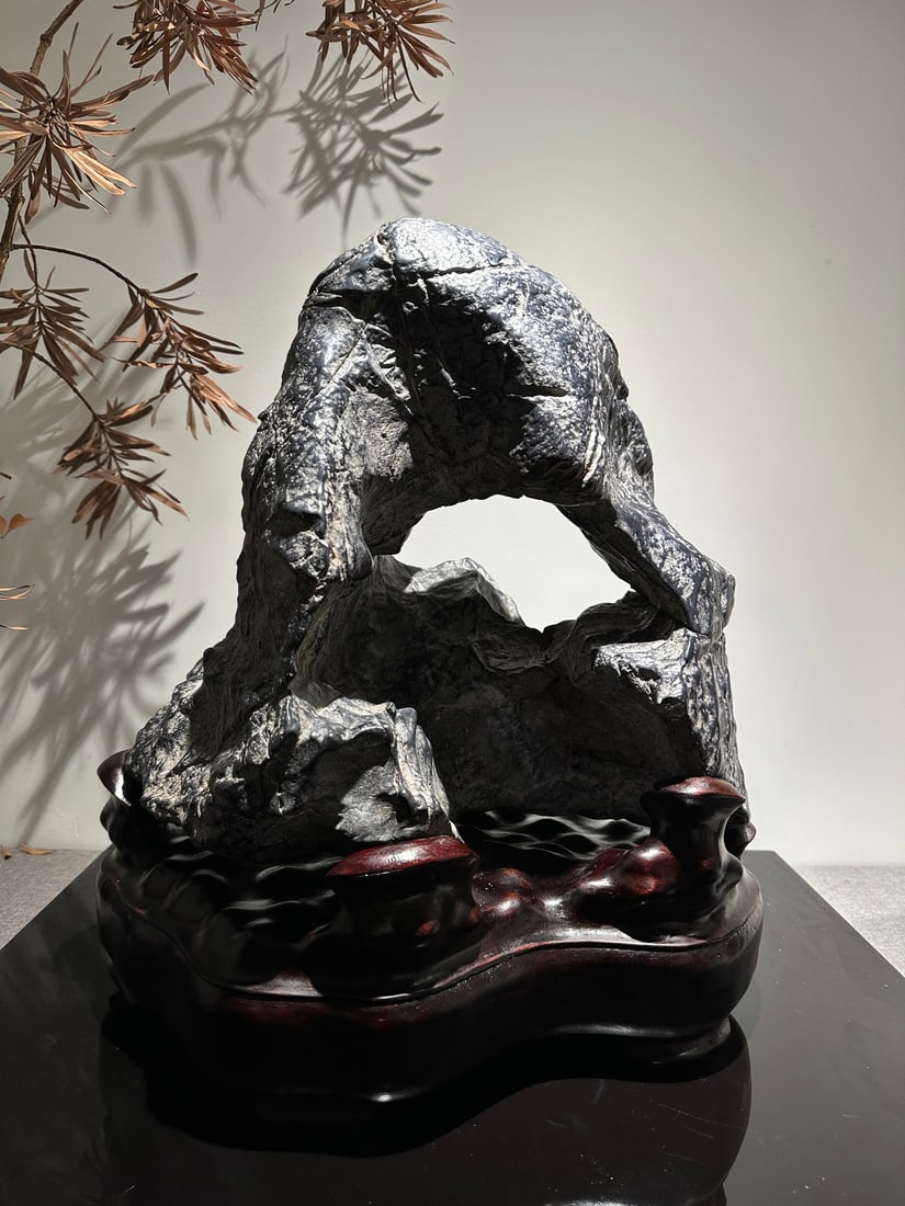 An Exquisite Lingbi Stone Ornament: An Exquisite Lingbi Stone Ornament Qing Dynasty, China Size:48cmx40cmx30cm (The Dimensions Of All Batches Are Manually Measured.If You Need More Detailed Information, Please Contact Our Customer