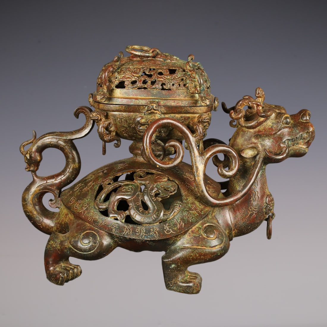 An Exquisite Bronze Auspicious Beast-Shaped Censer: An Exquisite Bronze Auspicious Beast-Shaped Censer Han Dynasty, China Size:53cmx37cm Weight:11650g (The Dimensions Of All Batches Are Manually Measured.If You Need More Detailed Information, Please