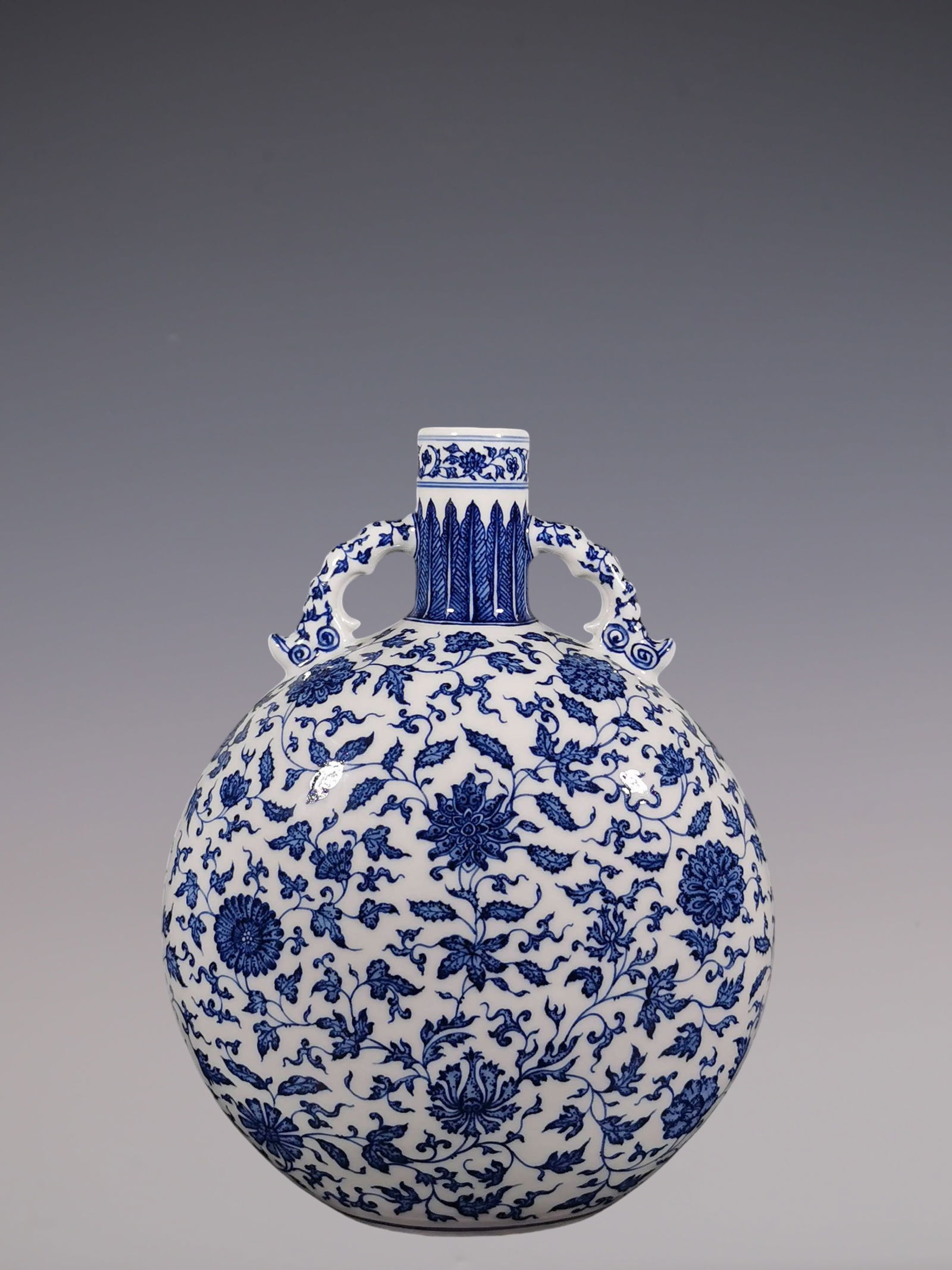 An Exquisite Blue and White Lotus Pattern Double-Ears Vase: An Exquisite Blue and White Lotus Pattern Double-Ears Vase Qing Dynasty, China Yongzheng Six-character Mark Size:36.6cmx28.6cm (The Dimensions Of All Batches Are Manually Measured.If You Need More Det