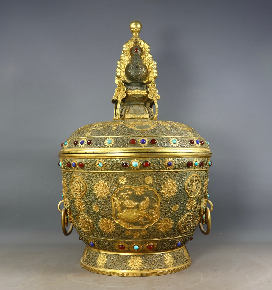 An Exquisite Gilt Bronze Inlaid Gems Flower and Bird Pattern Jar: An Exquisite Gilt Bronze Inlaid Gems Flower and Bird Pattern Jar Qing Dynasty, China Qianlong Four-character Mark Size:47cmx29cm Weight:8750g (The Dimensions Of All Batches Are Manually Measured.If