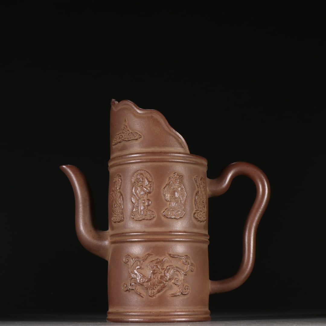 An Exquisite Purple Sands Figure Pattern Teapot: An Exquisite Purple Sands Figure Pattern Teapot Qing Dynasty, China Size:18cmx16cm (The Dimensions Of All Batches Are Manually Measured.If You Need More Detailed Information, Please Contact Our