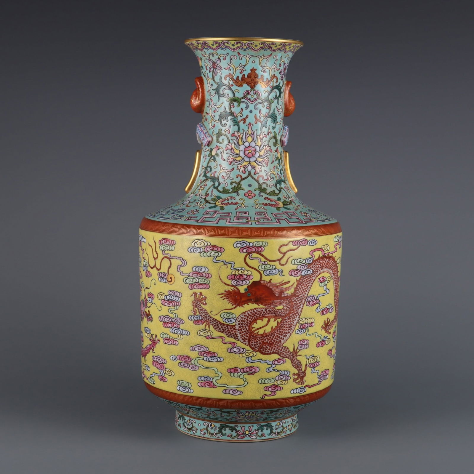 An Exquisite Famille-Rose Lotus Pattern Dragon Pattern Double-Ears Vase: An Exquisite Famille-Rose Lotus Pattern Dragon Pattern Double-Ears Vase Qing Dynasty, China Qianlong Six-character Mark Size:38.2cmx11.3cm (The Dimensions Of All Batches Are Manually Measured.If You N