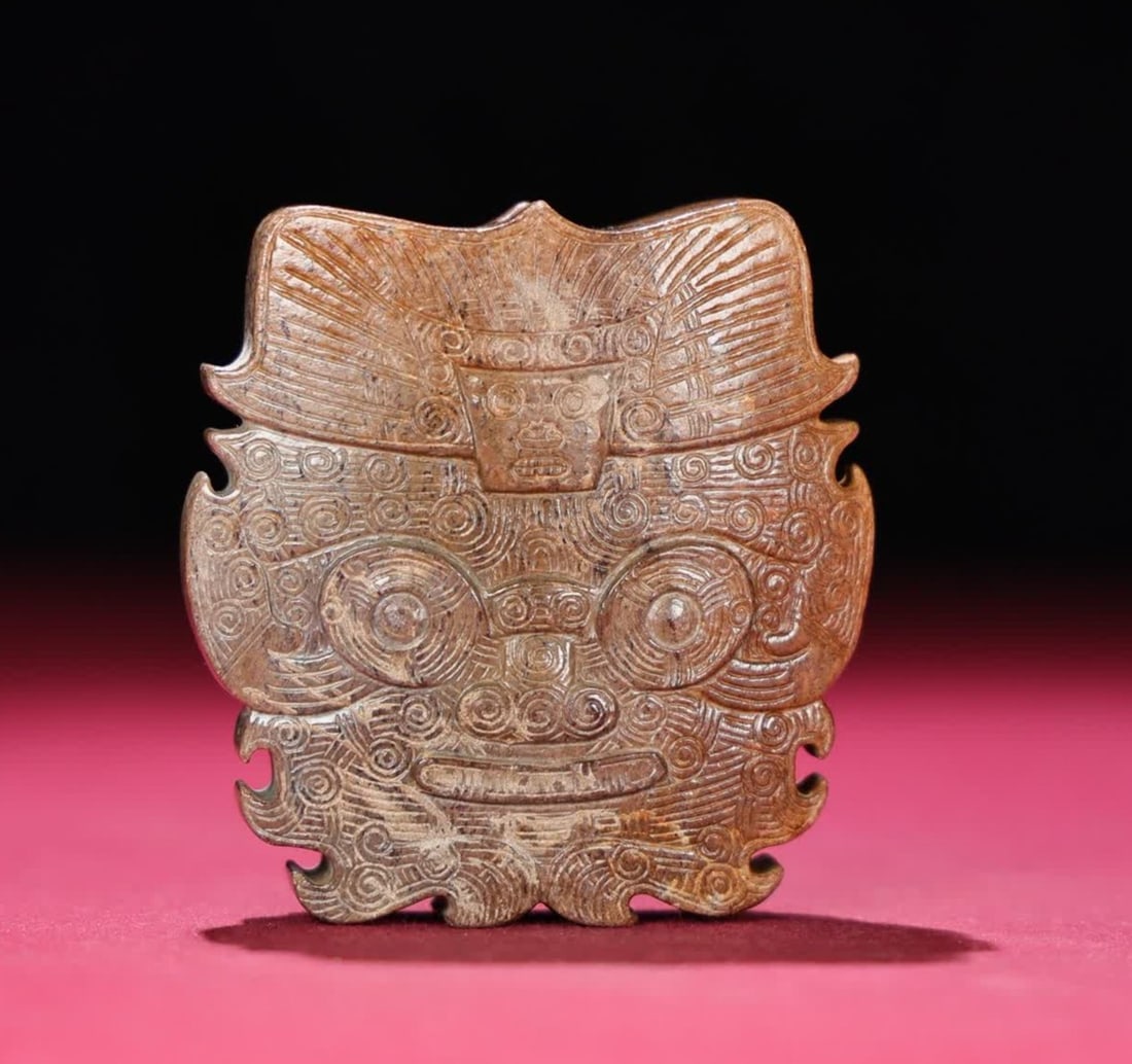 A Han Dynasty Liangzhu hanging ornament (1 of 9)