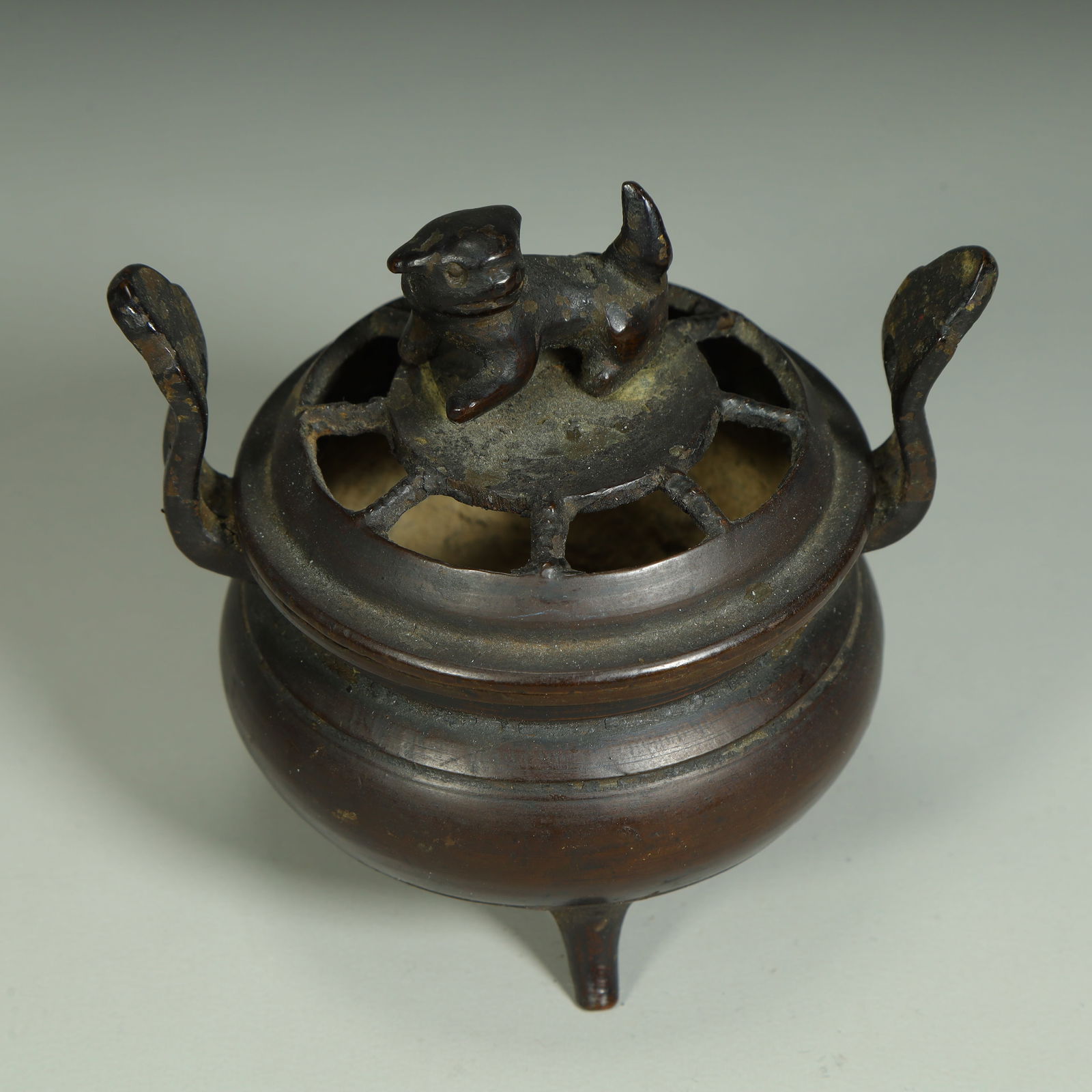 A copper beast button amphora three-legged smoker - 2