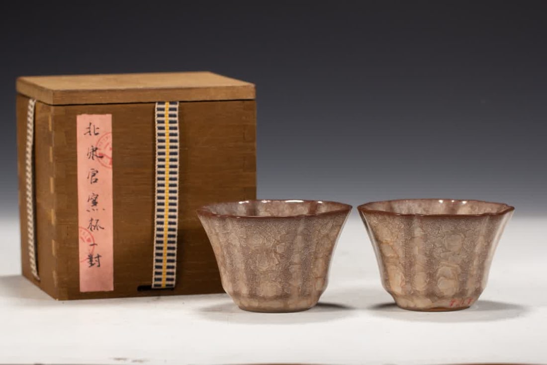 A pair of official kiln cups of the Song Dynasty: A pair of official kiln cups in the Song Dynasty SIZE: L:8cm W:8cm H:5.5cm (The Dimensions Of All Batches Are Manually Measured.If You Need More Detailed Information, Please Contact Our Customer