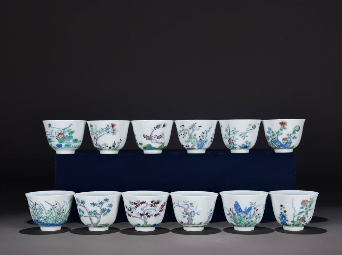 A set of Qing Kangxi blue and white colorful twelve flower god cup set: Qing Kangxi blue and white colorful twelve flower god cup set SIZE: H:5cm W:6.5cm (The Dimensions Of All Batches Are Manually Measured.If You Need More Detailed Information, Please Contact Our Custome