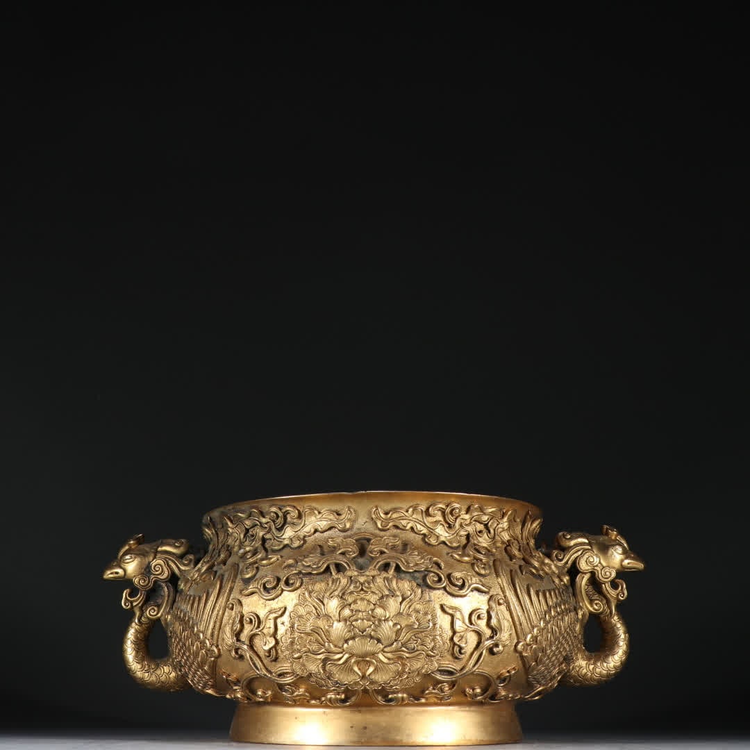 A Qing Dynasty copper gilt entwined lotus pattern phoenix head ear incense burner: Qing Dynasty copper gilt entwined lotus pattern phoenix head ear incense burner SIZE: H:9.3cm W:23cm W:2123.4g (The Dimensions Of All Batches Are Manually Measured.If You Need More Detailed