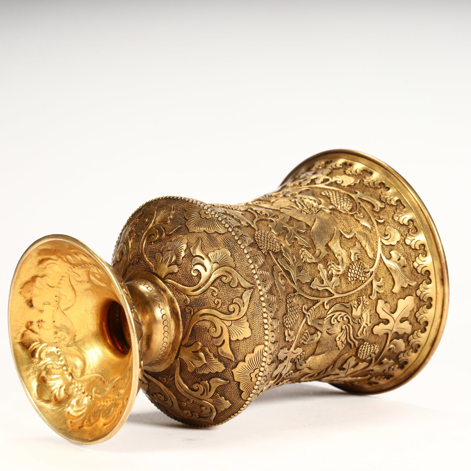 A copper-gilt auspicious beast grape-patterned goblet. - 10
