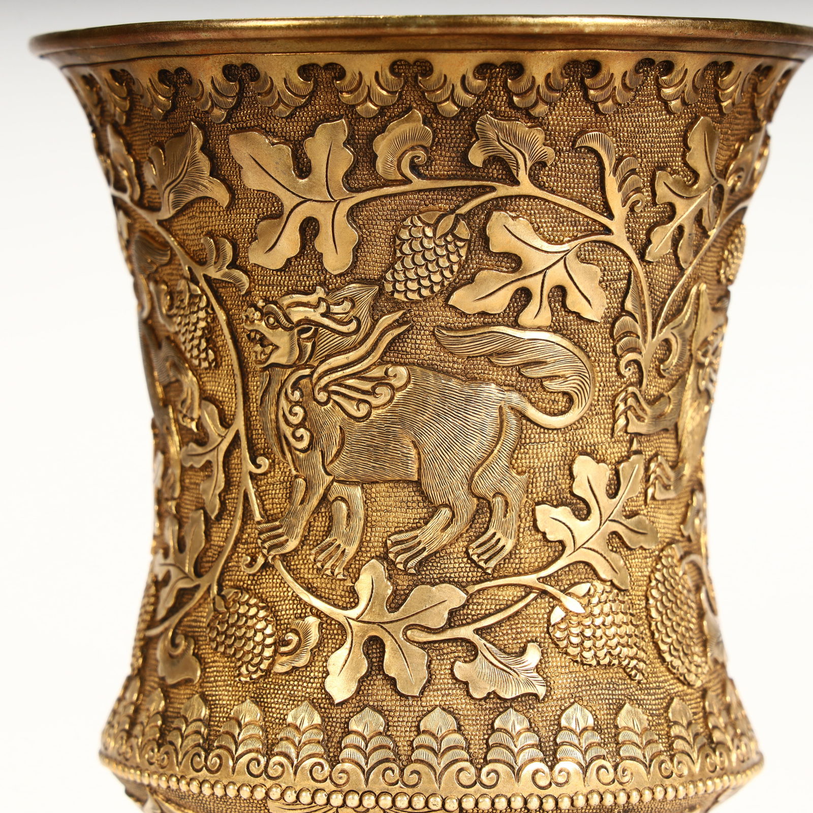A copper-gilt auspicious beast grape-patterned goblet. - 8