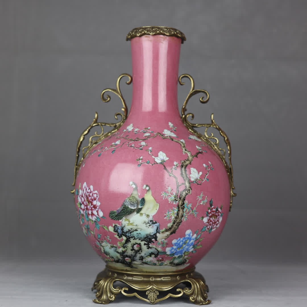 A Qing Dynasty carmine red background pastel flower and bird pattern inlaid copper lace celestial: Qing Dynasty carmine red background pastel flower and bird pattern inlaid copper lace celestial ball vase SIZE: H:45cm mouthD:11cm Abdominal diameter 27cm Bottom diameter 22cm (The Dimensions Of All B