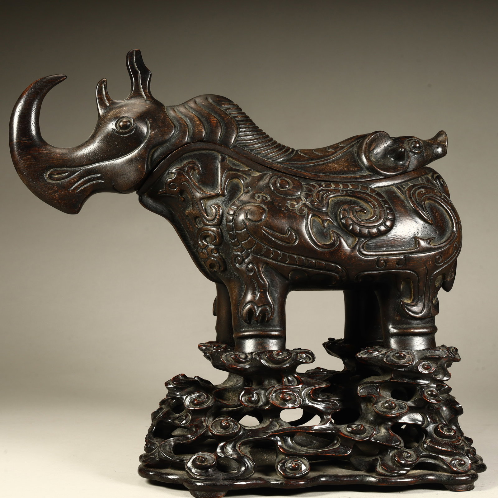 A Qing Dynasty agarwood carving antique rhinoceros ornament: Qing Dynasty agarwood carving antique rhinoceros ornament SIZE: Total H: 28cm H: 20cm L: 30cm W: 11cm W: 400g (The Dimensions Of All Batches Are Manually Measured.If You Need More Detailed