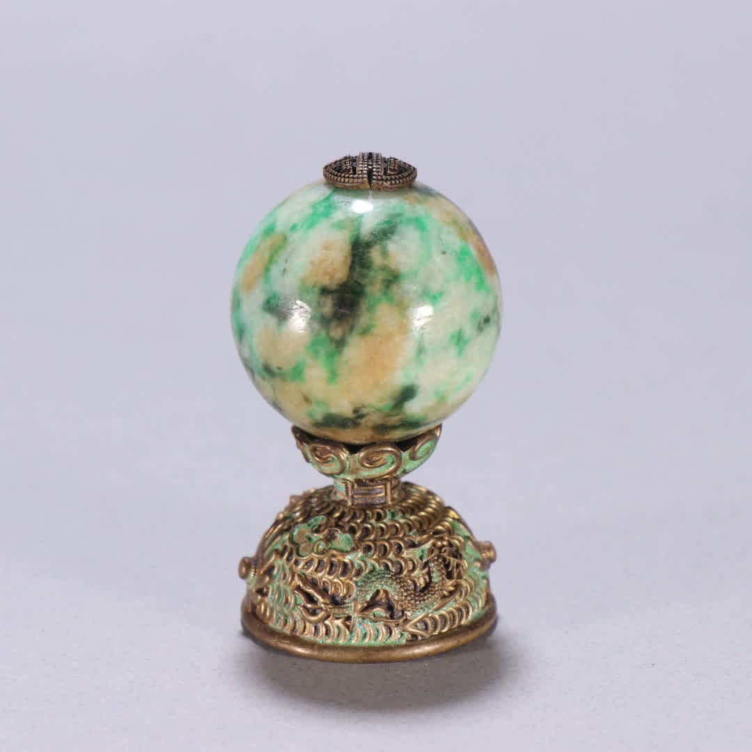 A Qing Dynasty copper-gilt jade hat top: Qing Dynasty copper gilt inlaid jade hat top SIZE: H: 5.5cm Bead diameter 3.1cm W: 75.4g (The Dimensions Of All Batches Are Manually Measured.If You Need More Detailed Information, Please Contact Our