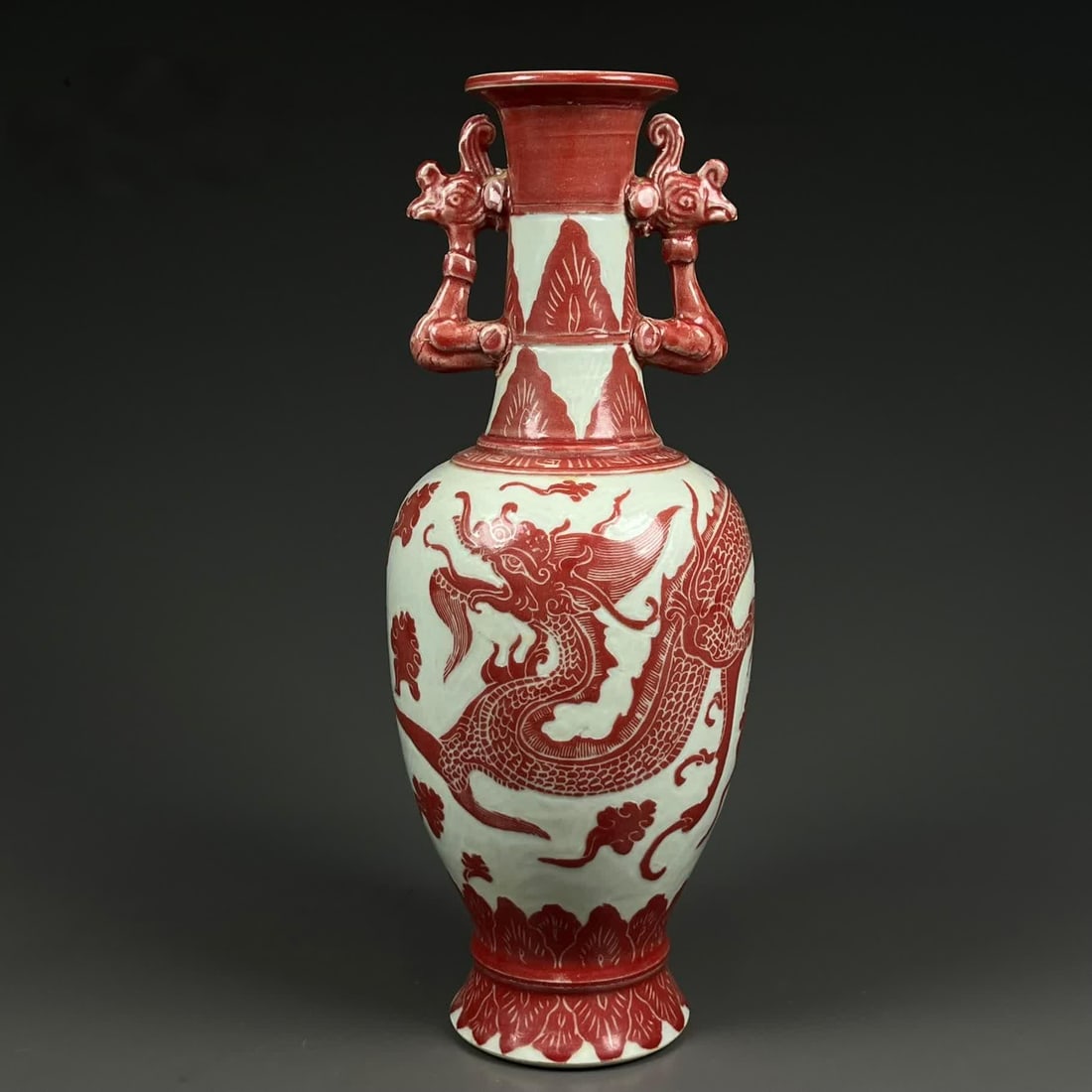 A Song Ding kiln white ground red dragon pattern phoenix ear bottle: Song Ding kiln white ground red dragon pattern phoenix ear bottle SIZE: H:33cm D:13cm (The Dimensions Of All Batches Are Manually Measured.If You Need More Detailed Information, Please Contact Our