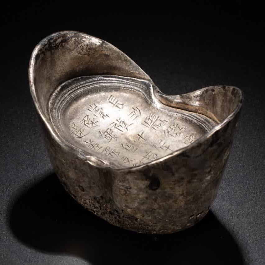 A silver ingot from the Qing Dynasty: Silver ingots of the Qing Dynasty SIZE: L:12cm W:7.5cm H:9cm (The Dimensions Of All Batches Are Manually Measured.If You Need More Detailed Information, Please Contact Our Customer Service Before