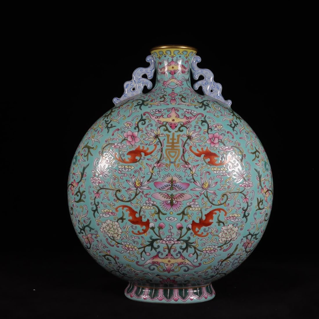 A Qianlong period of the Qing Dynasty turquoise green field entwined flower amphora moon vase: Qianlong year of the Qing Dynasty turquoise green field entwined flower amphorae moon vase SIZE: H: 32.5cm Belly diameter 26cm mouth D: 6cm Bottom diameter 12cm (The Dimensions Of All Batches Are Manu
