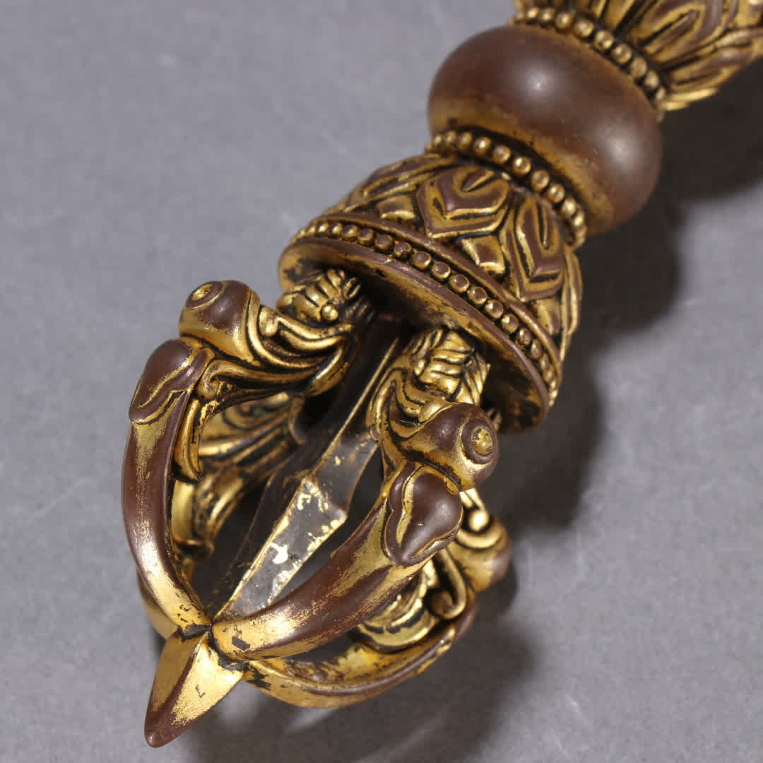 A copper gilt vajra - 2