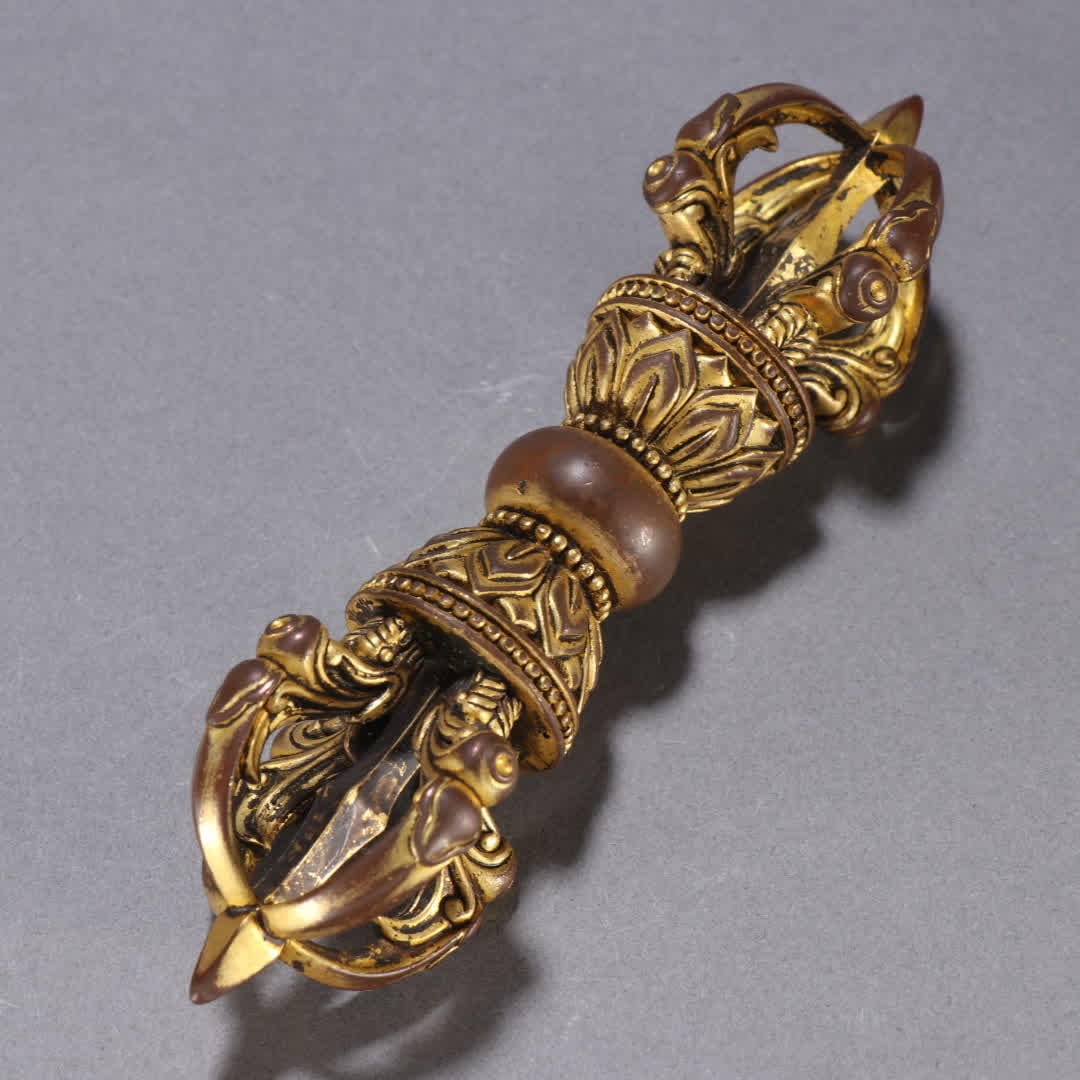 A copper gilt vajra - 7