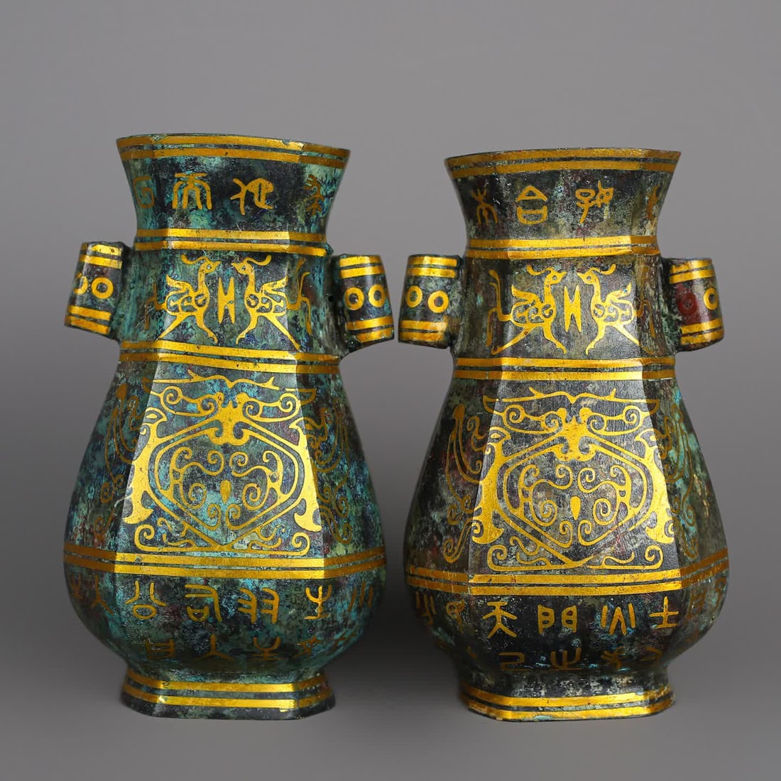 A Han Dynasty bronze Cuojin amphora square bottle: Han Dynasty A pair of bronze Cuojin amphorae SIZE: Total W: 2523g Single L: 11cm W: 8.5cm H: 18cm (The Dimensions Of All Batches Are Manually Measured.If You Need More Detailed Information, Please