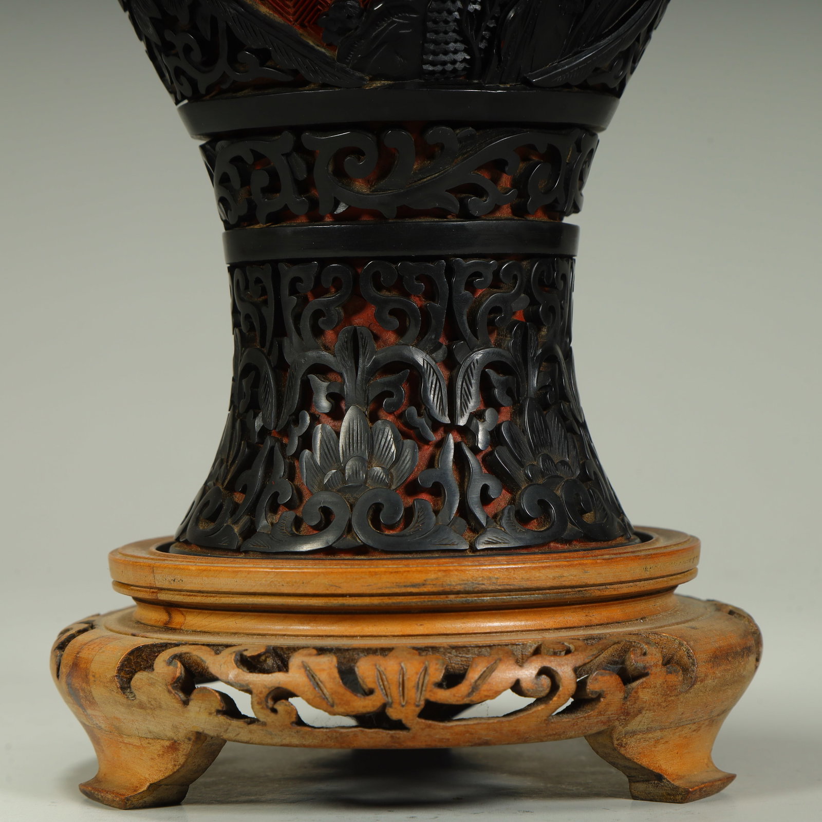 A red and black character pattern bottle - 3