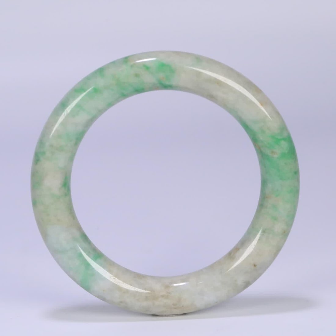 A Qing Dynasty jade old round bar bracelet (1 of 9)