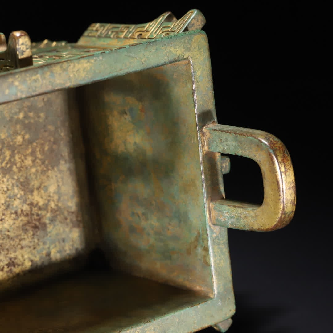 A Ming Dynasty copper gilt gluttonous pattern tripod - 12