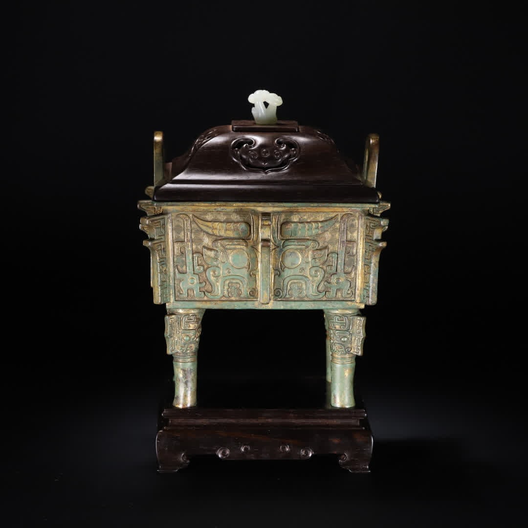 A Ming Dynasty copper gilt gluttonous pattern tripod - 4