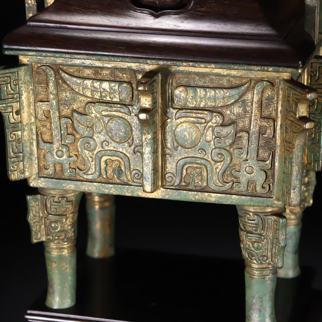 A Ming Dynasty copper gilt gluttonous pattern tripod - 8