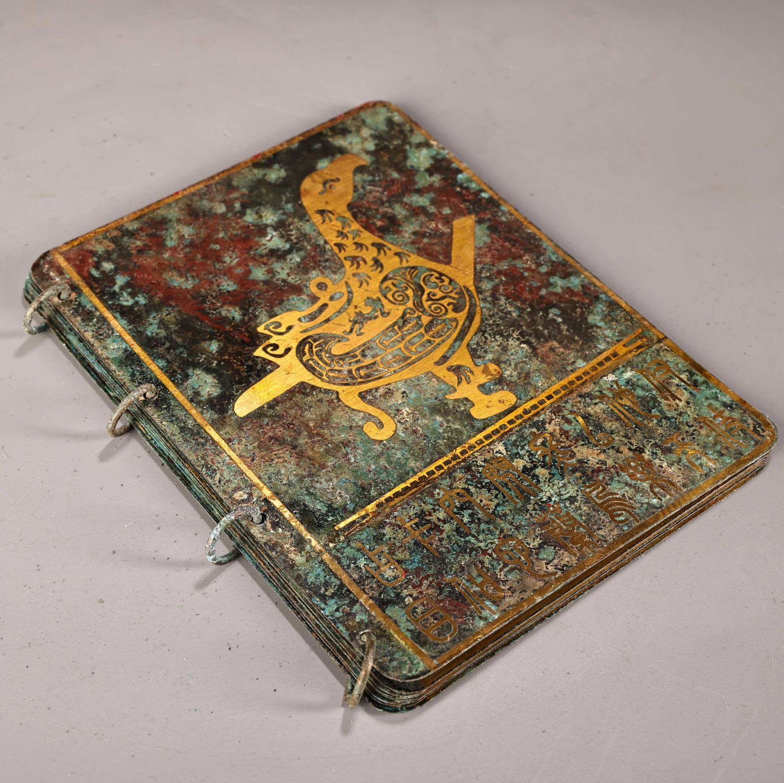 A bronze gold book - 2