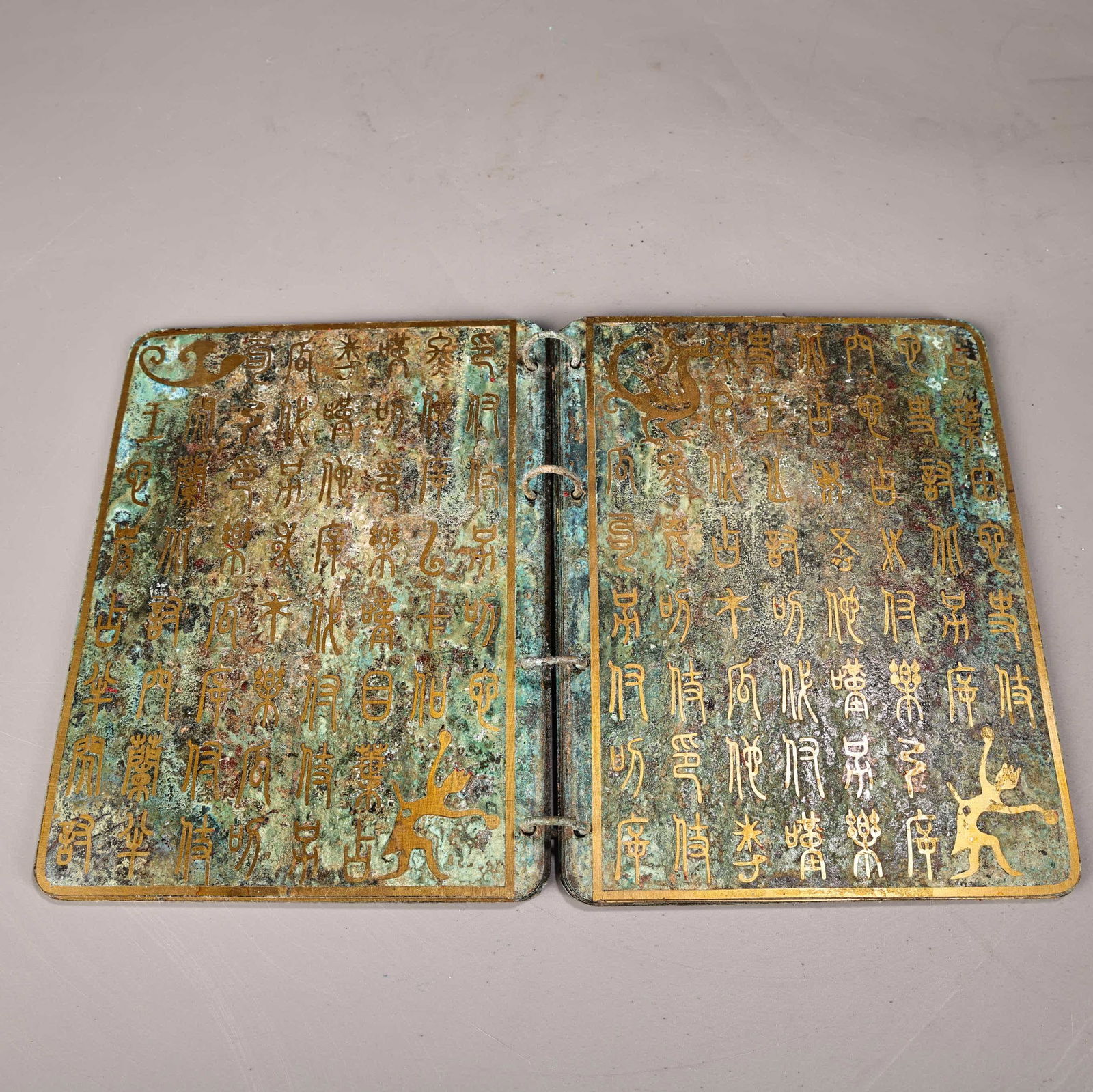A bronze gold book - 4