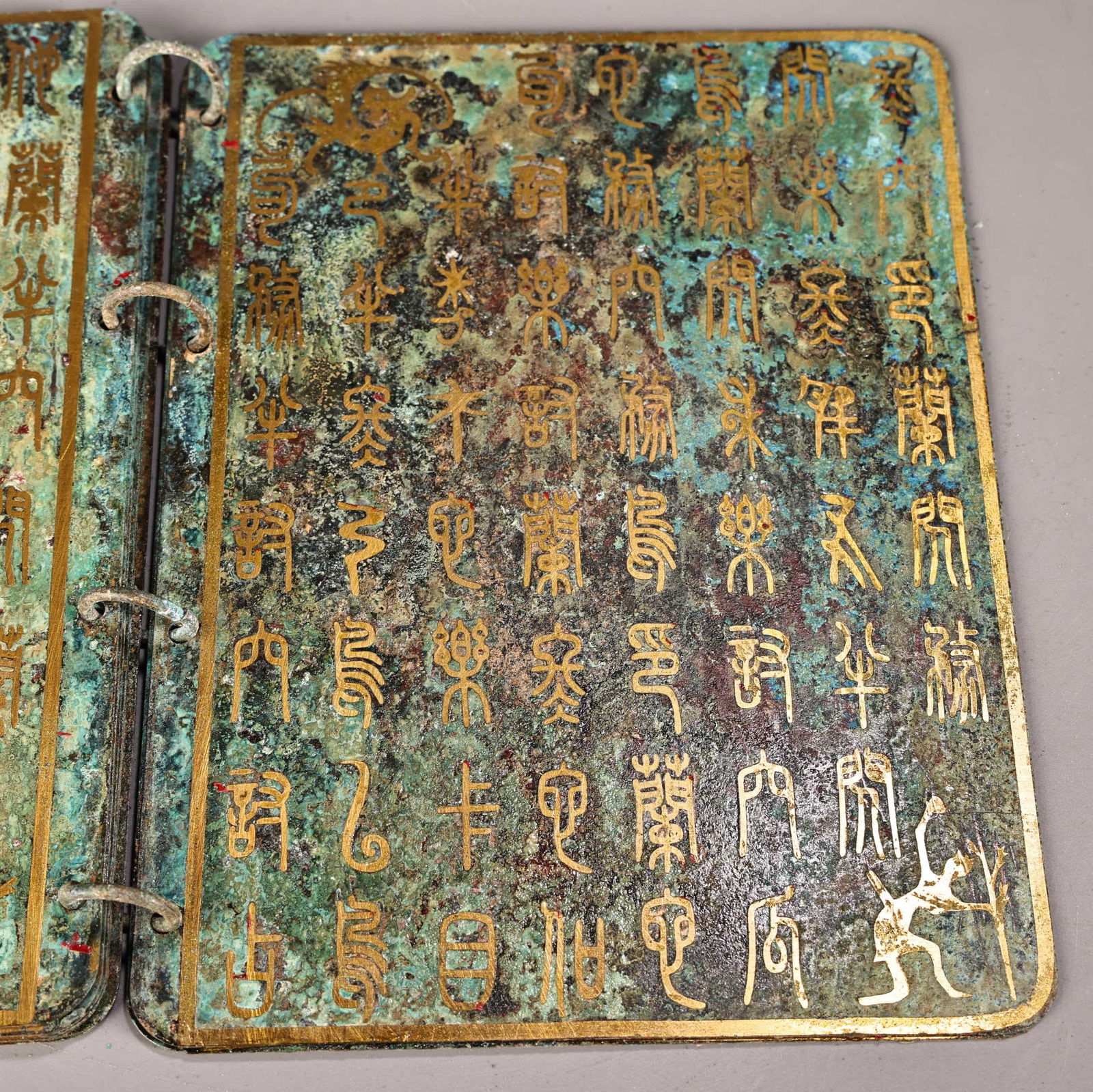 A bronze gold book - 7
