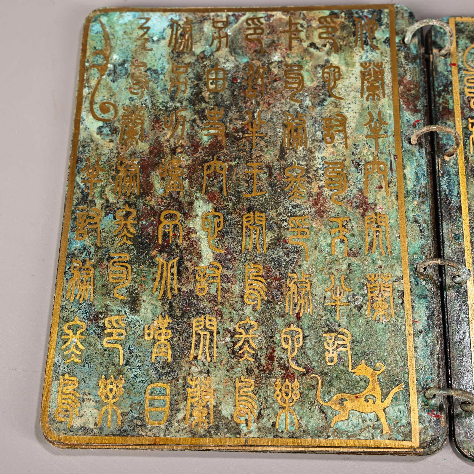 A bronze gold book - 8