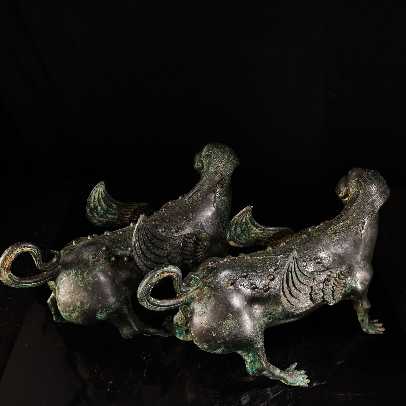 A bronze human-faced flying beast - 10