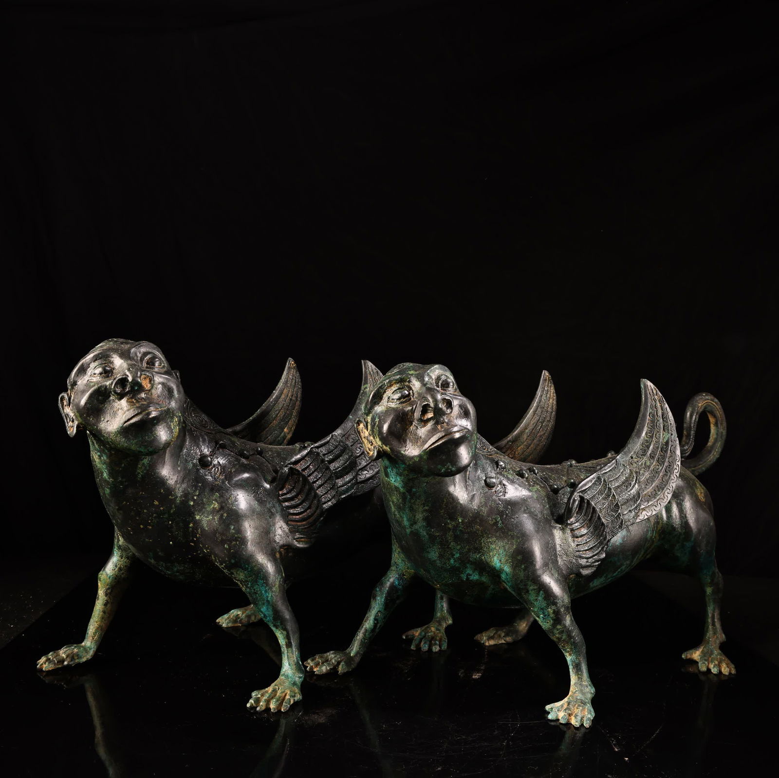 A bronze human-faced flying beast - 2