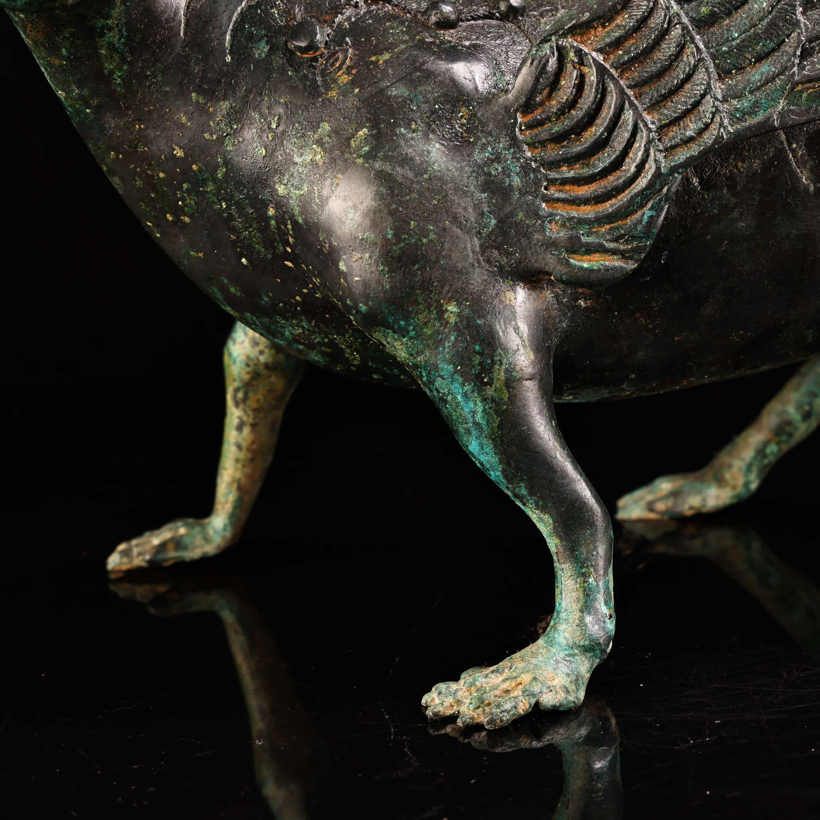 A bronze human-faced flying beast - 6
