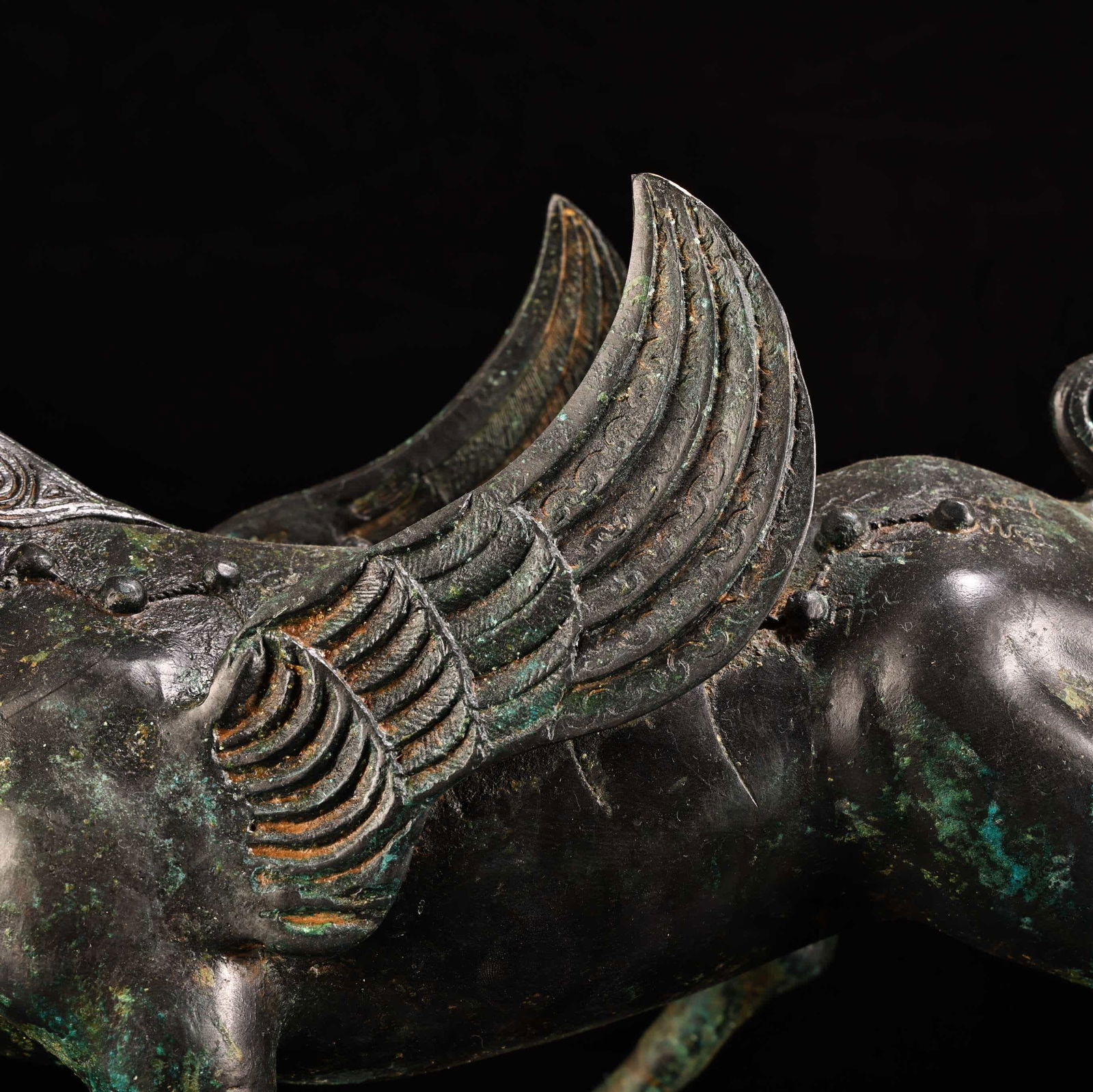 A bronze human-faced flying beast - 7
