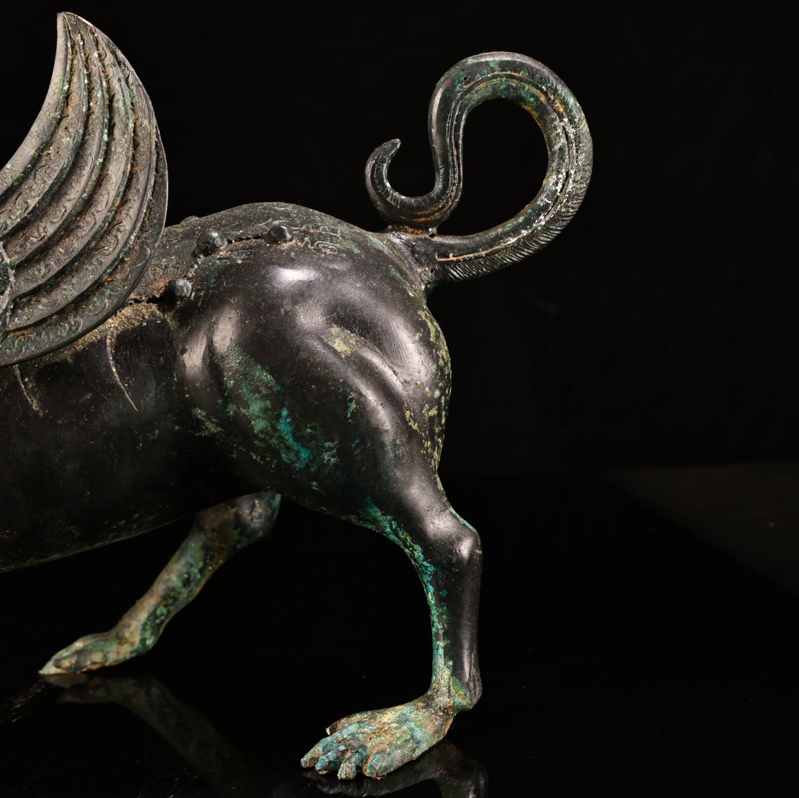 A bronze human-faced flying beast - 8