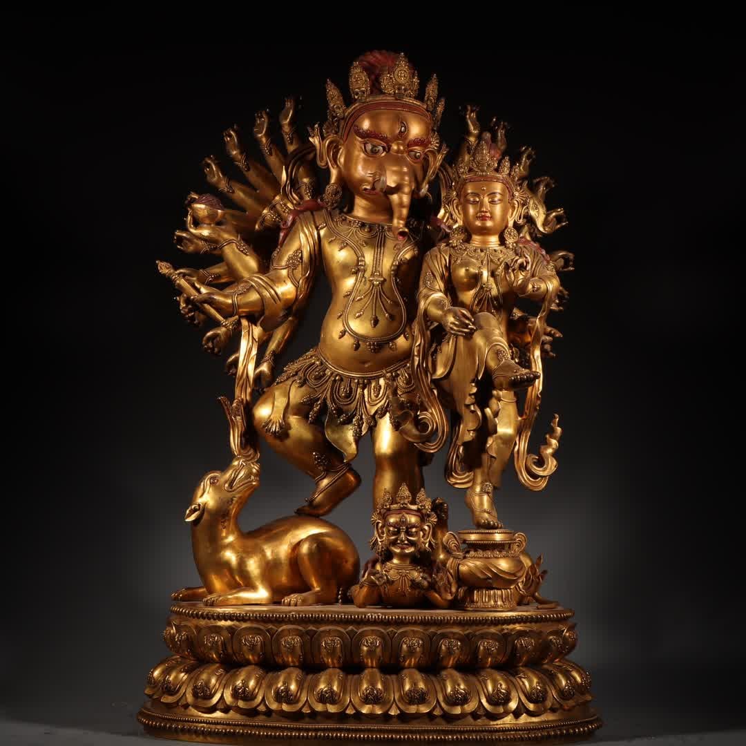 A statue of the God of Wealth with a copper-gilt elephant trunk in the Qing Dynasty: Qing Dynasty Tibetan bronze gilt elephant trunk statue of the God of Wealth SIZE: W:48kg H:71cm W:46cm T:34cm (The Dimensions Of All Batches Are Manually Measured.If You Need More Detailed Information