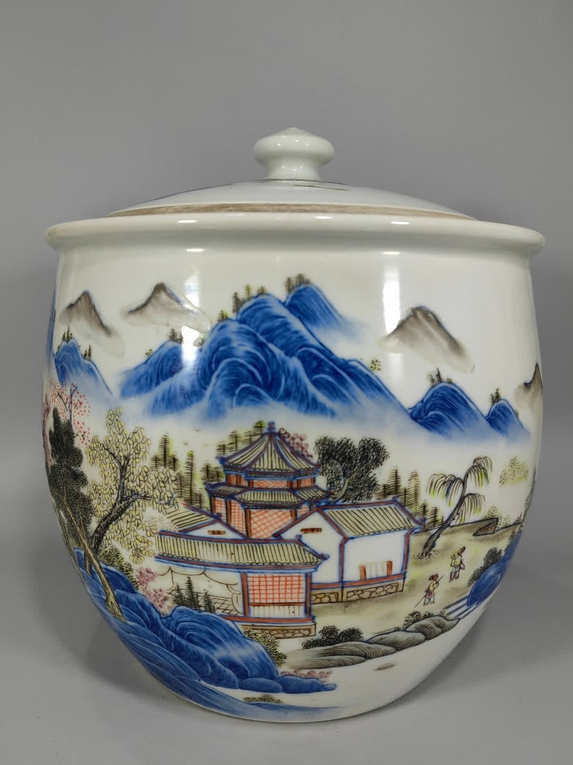 A Qing Dynasty blue and white plus landscape cover jar (1 of 9)