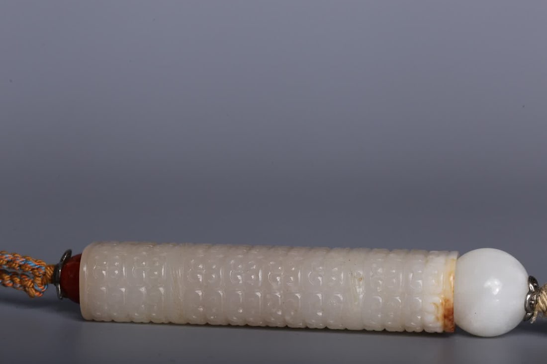 A Qing Dynasty Hetian jade drum nail pattern - 9