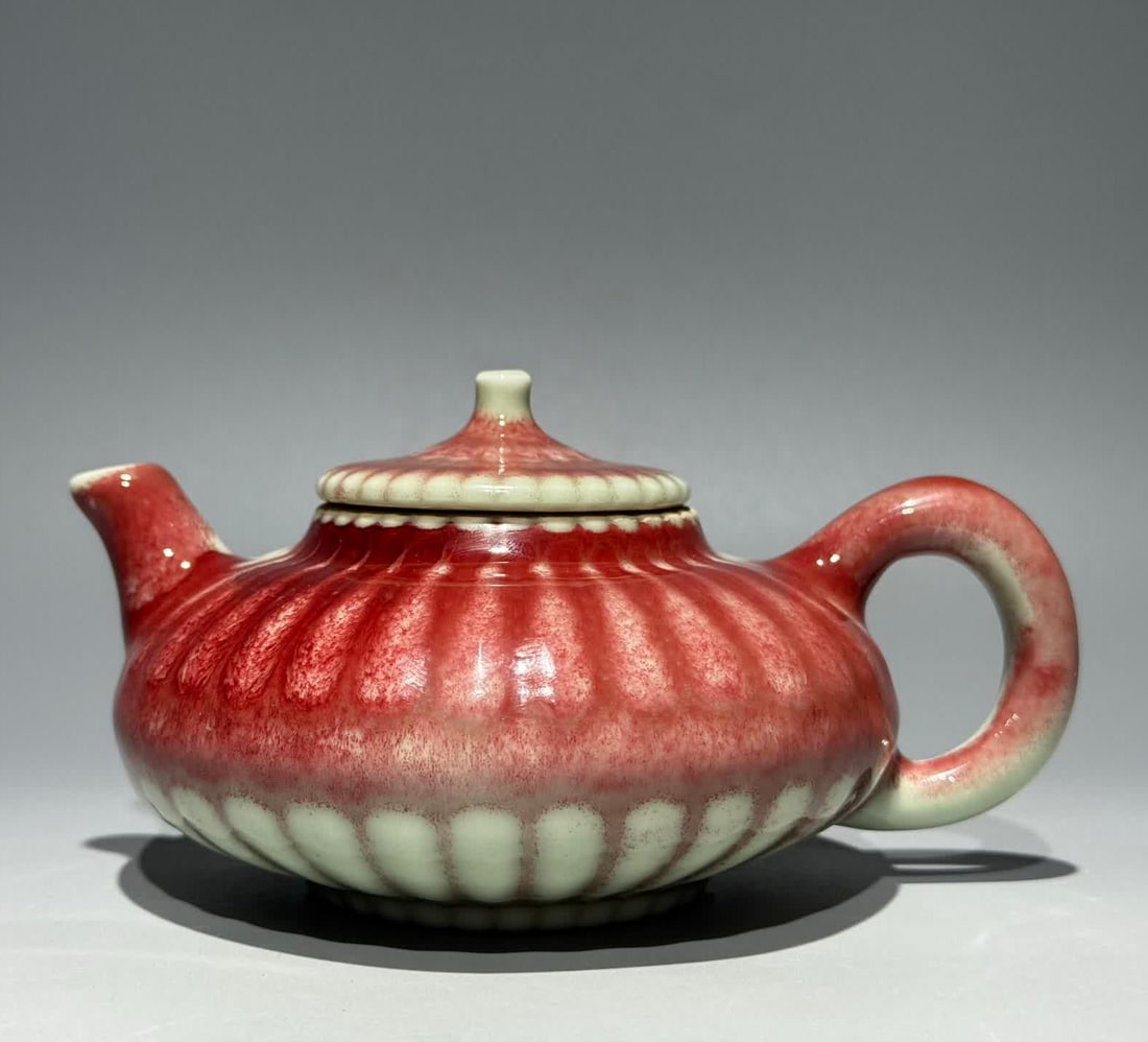 A Qing Yongzheng Jun kiln carved chrysanthemum petal pot: Qing Yongzheng Jun kiln carved chrysanthemum petal pot SIZE: L:15.5cm W:11.8cm H:8.8cm (The Dimensions Of All Batches Are Manually Measured.If You Need More Detailed Information, Please Contact Our Cu