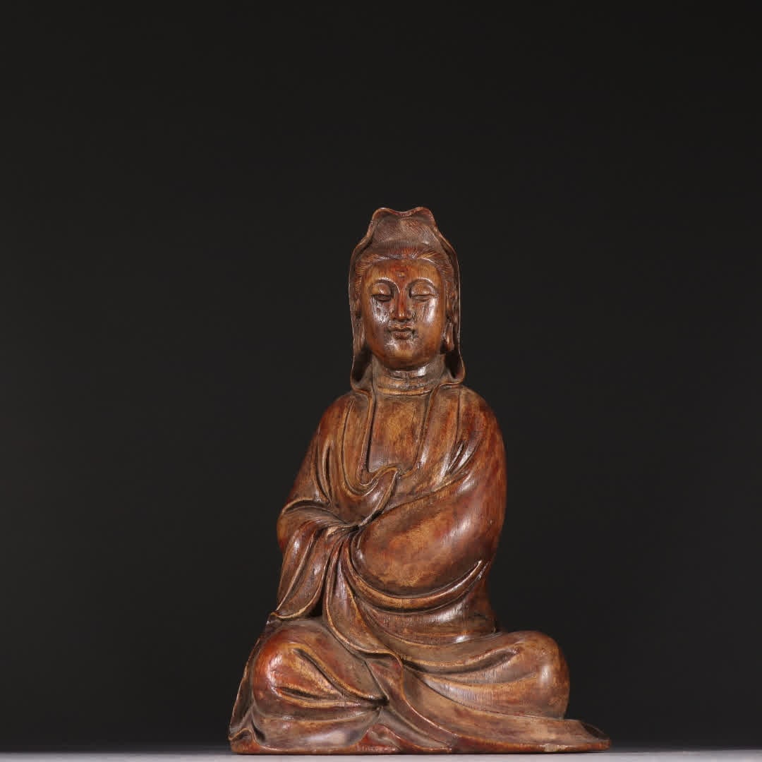 A seated statue of Guanyin with agarwood: Qing Dynasty agarwood free Guanyin seated statue SIZE: H:19cm W:11.7cm W:225.1g (The Dimensions Of All Batches Are Manually Measured.If You Need More Detailed Information, Please Contact Our Customer 