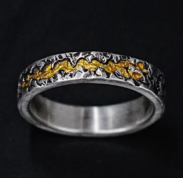 A silver gold ring - 2