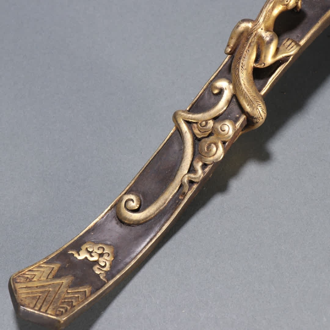 A Qing Dynasty copper gilt dragon pattern ruyi handle - 3