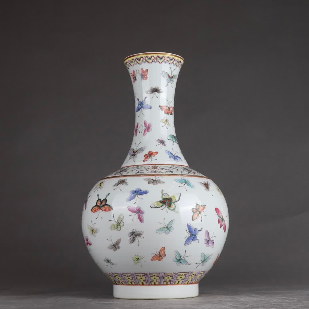 A Qing Guangxu pastel hundred plate appreciation bottle: Qing Guangxu pastel 100-disc appreciation bottle SIZE: H: 38cm Belly diameter 23.5cm (The Dimensions Of All Batches Are Manually Measured.If You Need More Detailed Information, Please Contact Our Cust