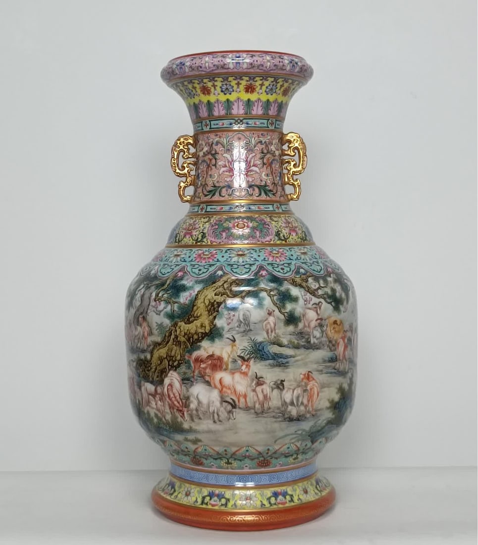 A Qing Qianlong enamel entwined pattern hundred sheep amphora porcelain mother bottle: Qing Qianlong enamel color intertwined pattern hundred sheep amphora porcelain mother bottle SIZE: H:60cm W:30cm (The Dimensions Of All Batches Are Manually Measured.If You Need More Detailed Informat