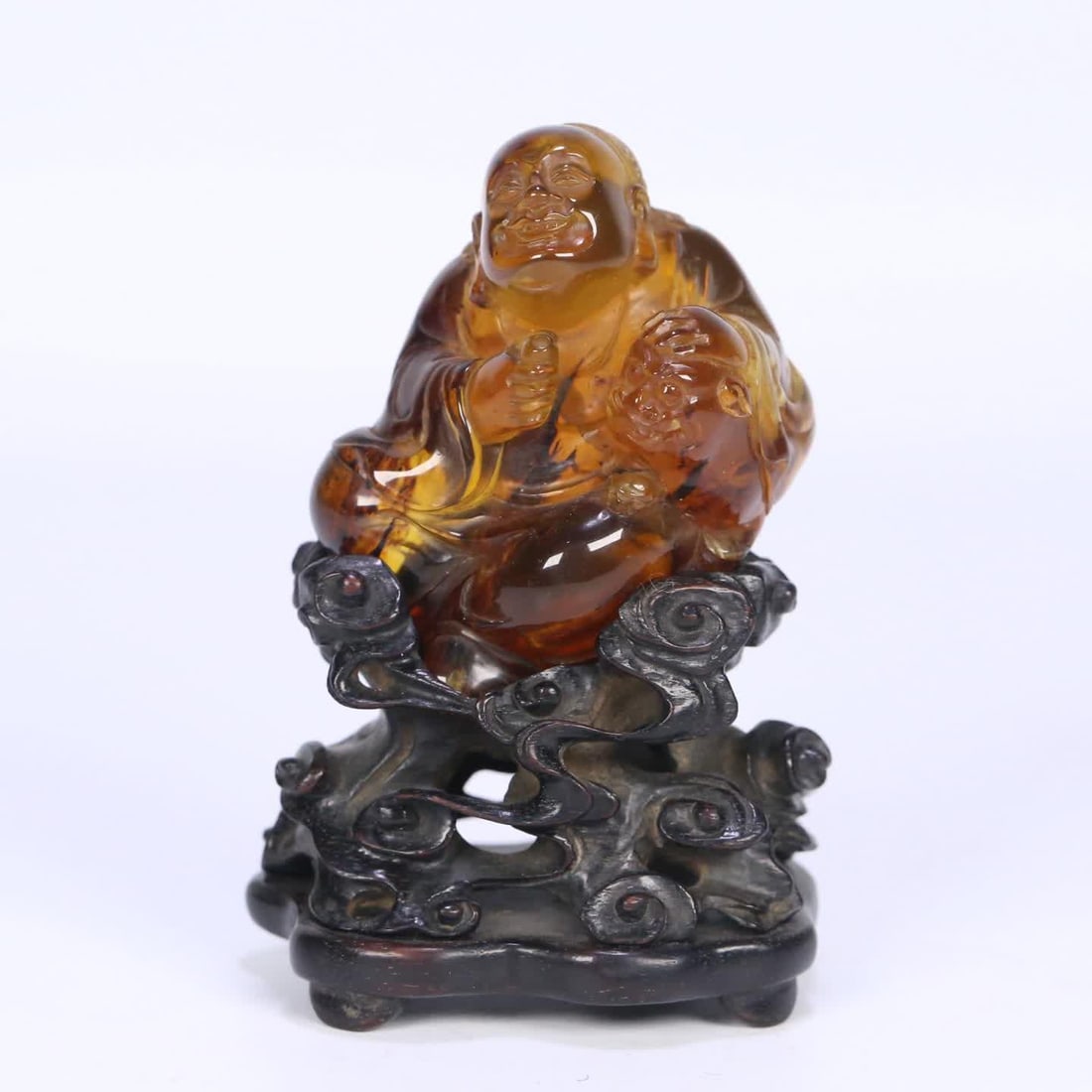 A Qing Dynasty rosewood support natural amber tiger voltaic ornament: Qing Dynasty Zitan Tuo natural amber tiger volaic ornament SIZE: 9.8x6.7x5.3cm Amber Net W: 49.8g g (The Dimensions Of All Batches Are Manually Measured.If You Need More Detailed Information, Please C