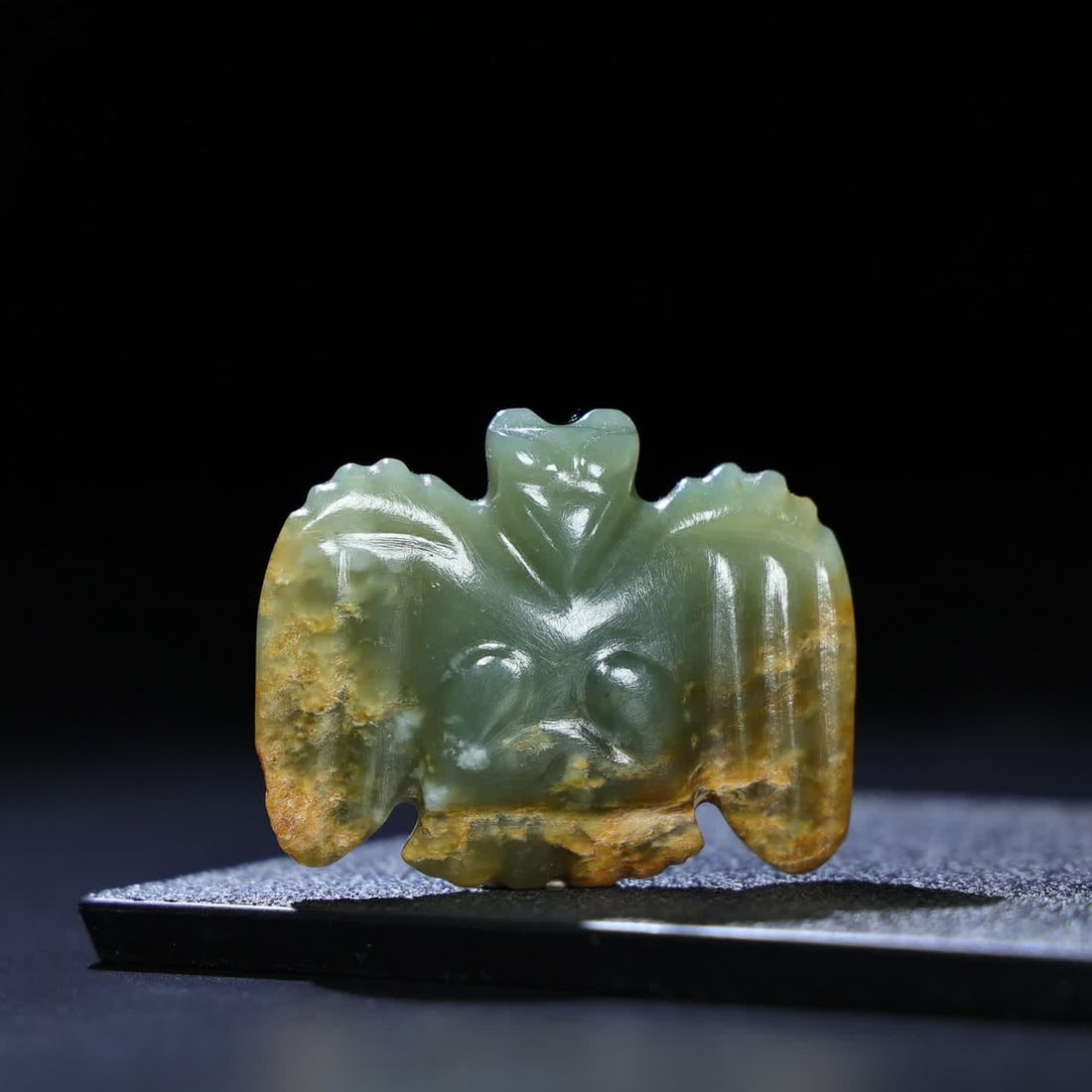 A Hongshan cultural eagle ornament: Hongshan cultural eagle ornament SIZE: 54x42x11mm W:34g (The Dimensions Of All Batches Are Manually Measured.If You Need More Detailed Information, Please Contact Our Customer Service Before Bidding.)