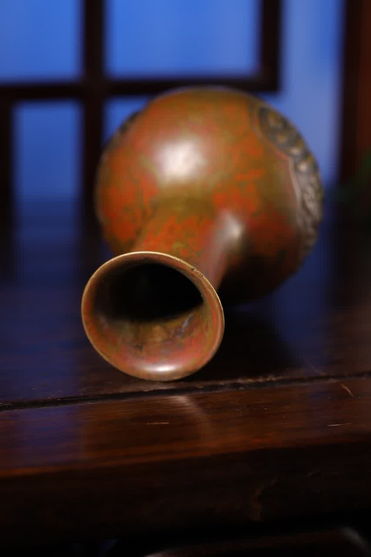 A Qing Dynasty copper Aven bottle - 8